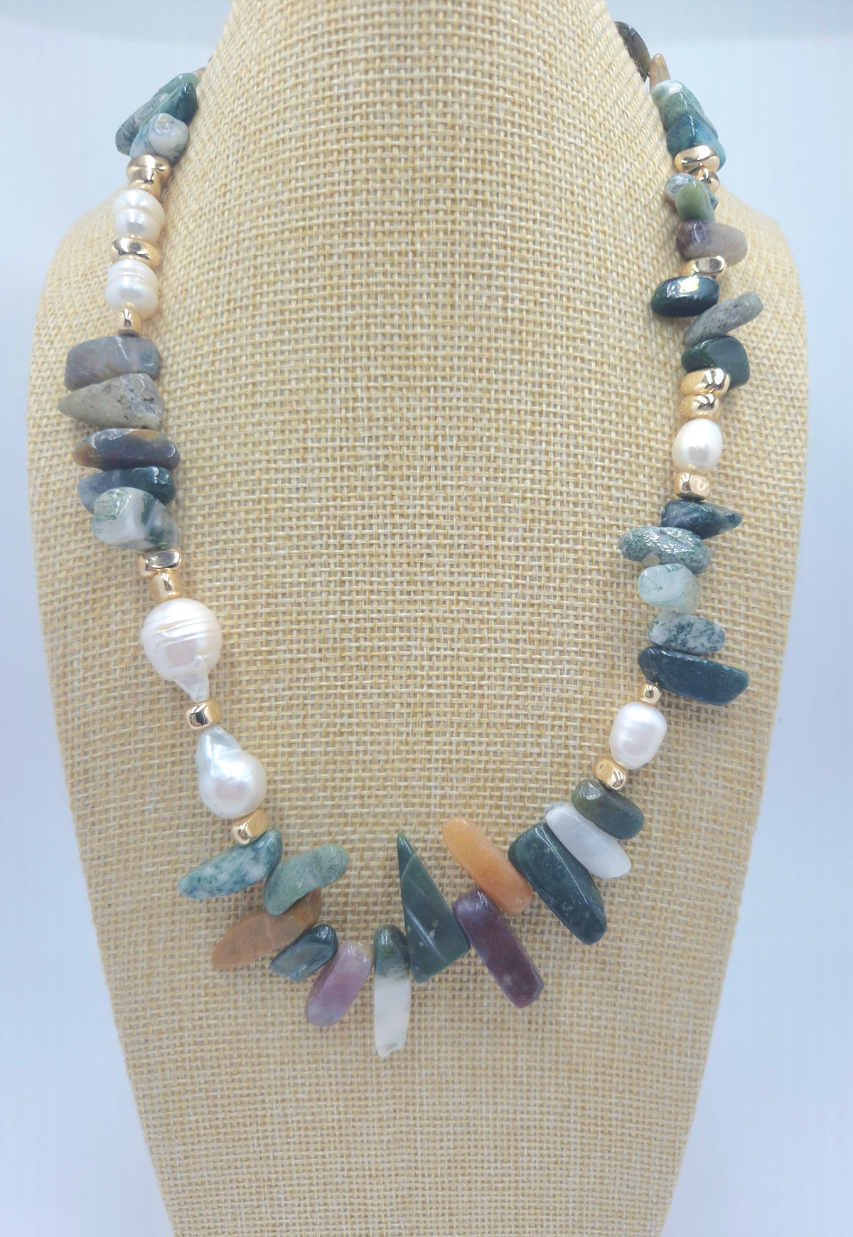 Natural baroque pearls and irregular gold hematite beads on an agate statement necklace