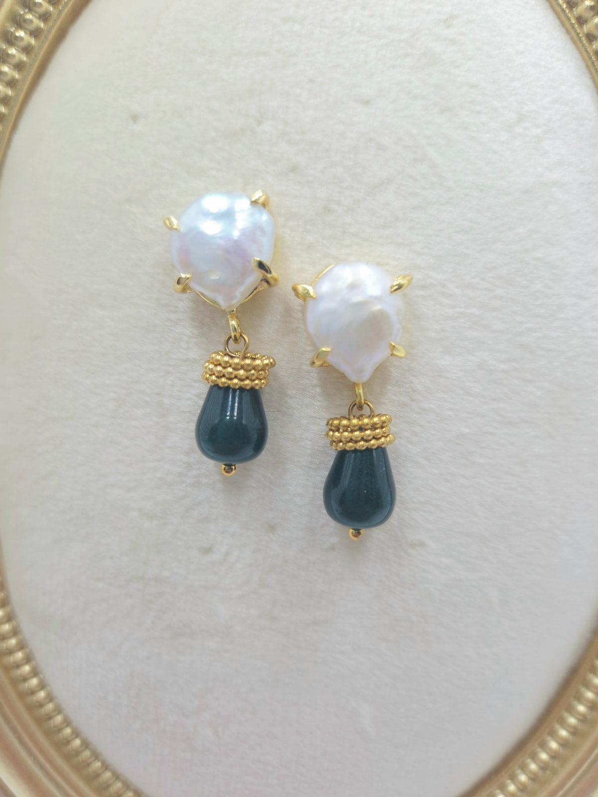 Alternate view of gold-plated brass pearl cushion stud earrings with deep sea green-blue stone drops