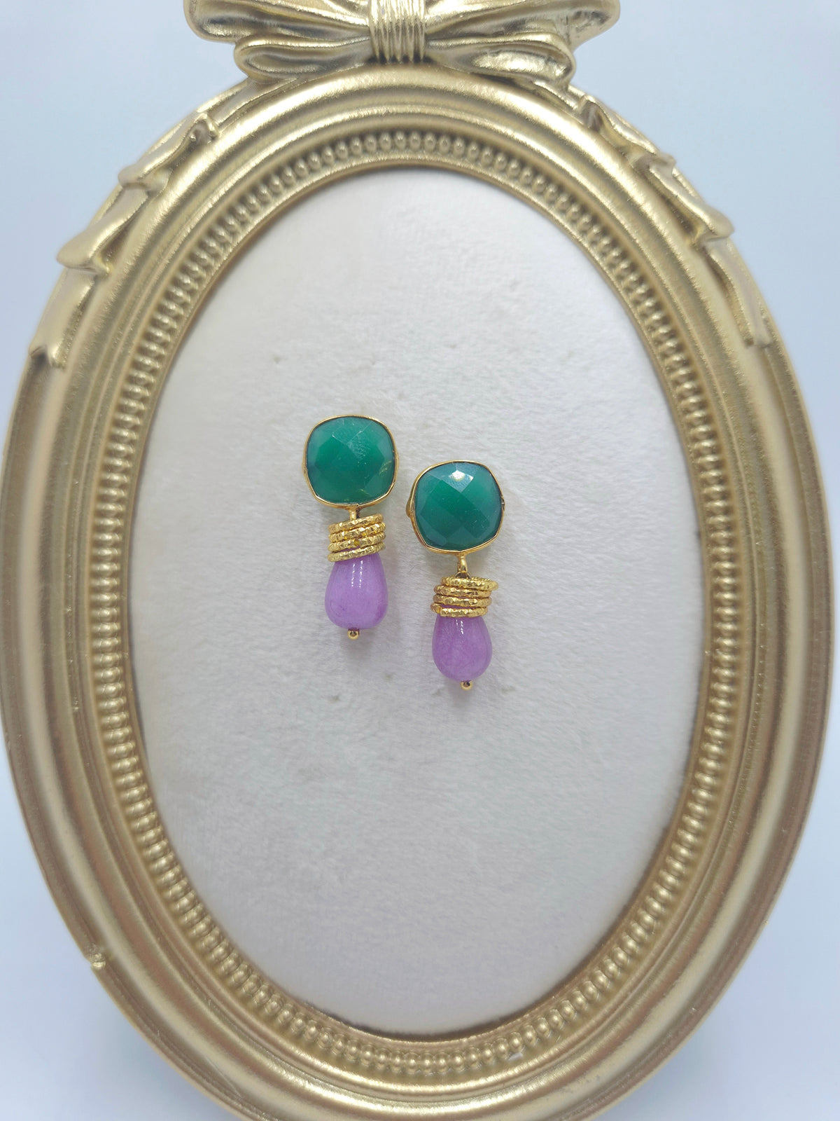 Green onyx cushion studs with pale purple stone drops and gold-tone accents